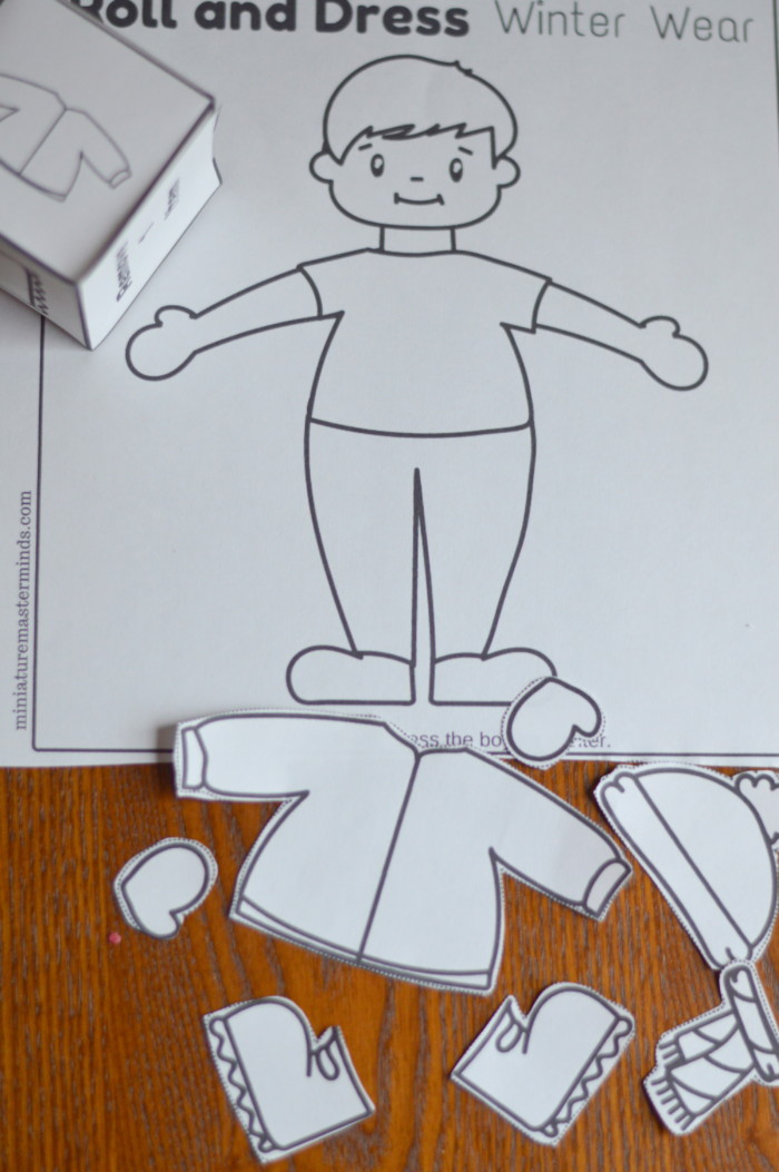 Roll and dress winter wear preschool roll the dice dress up paper doll coloring page activity â miniature masterminds