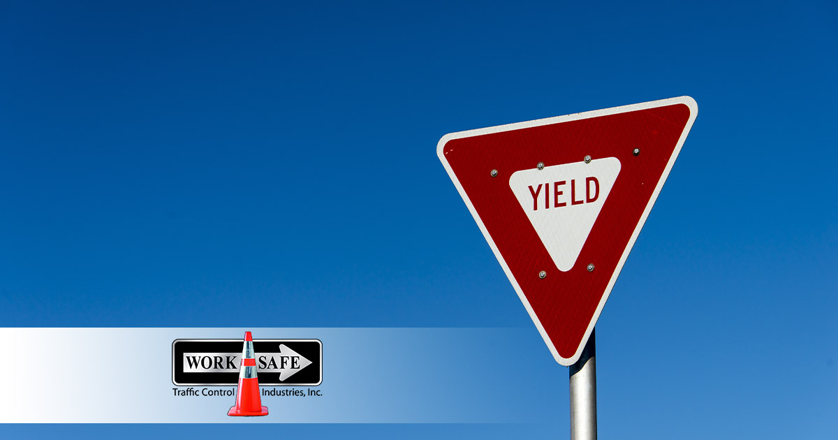 What do triangular road signs mean worksafe traffic control