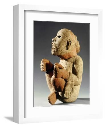 Stone figure of xipe totec the flayed lord aztec mexico c